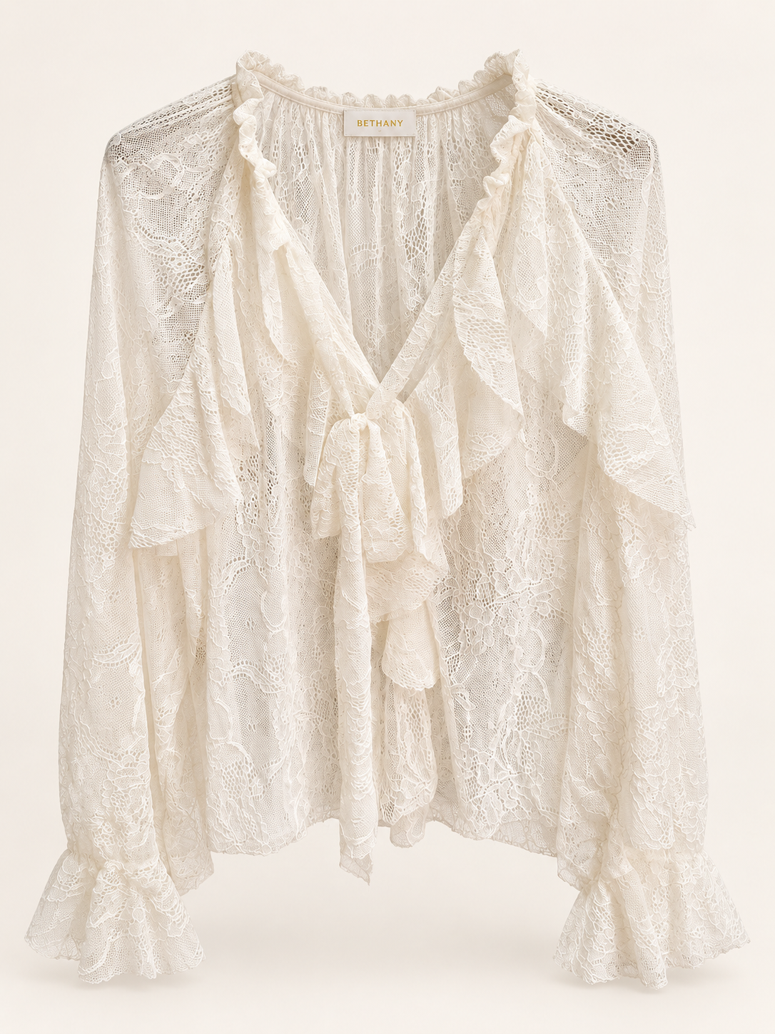 Blusa in Pizzo Isabella con Fiocco e Volant
